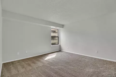 Bedroom - 14224 E 1st Dr #B02, Aurora, CO 80011 photo 9 of 10