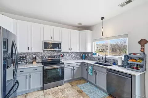 Kitchen - 19558 E 58th Cir, Aurora, CO 80019 photo 2 of 3