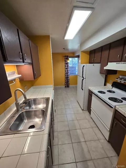 Kitchen - 12056 E 25th Ave, Aurora, CO 80010 photo 1 of 2