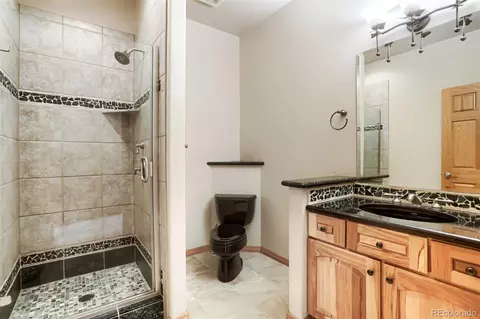 Bath - 15479 Ouray Rd, Pine, CO 80470 photo 4 of 6
