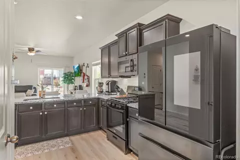 Kitchen - 319 Walnut St, Bennett, CO 80102 photo 7 of 7