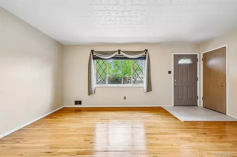 Living - 10209 W 68th Ave, Arvada, CO 80004 photo 2 of 4