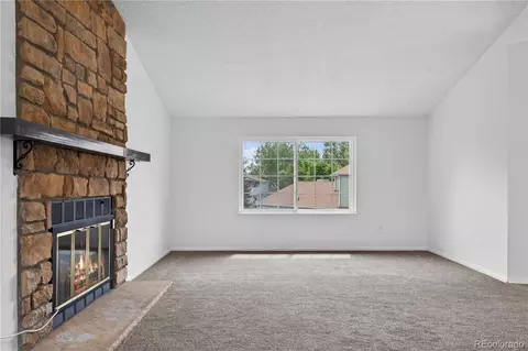 Living - 8417 Everett Way #E, Arvada, CO 80005 photo 5 of 7
