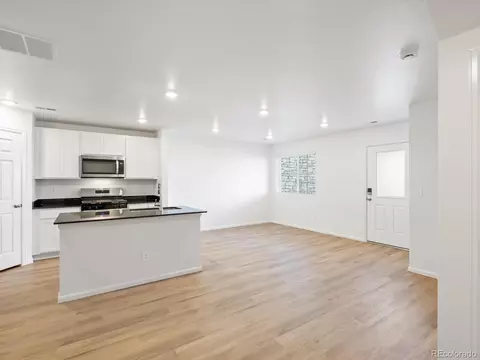 Living - 21256 E 65th Dr, Aurora, CO 80019 photo 2 of 3