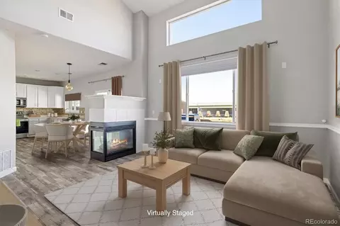 Living - 14853 E 119th Ave, Brighton, CO 80603 photo 2 of 7