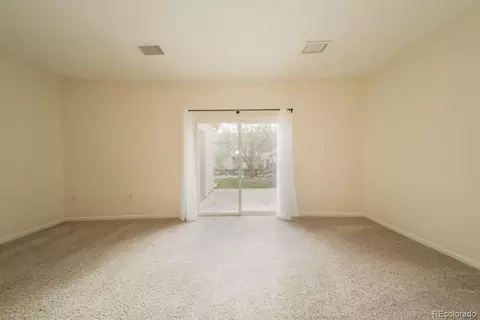 Living - 12780 Ivanhoe St, Thornton, CO 80602 photo 1 of 2
