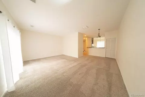 Living - 12780 Ivanhoe St, Thornton, CO 80602 photo 2 of 2