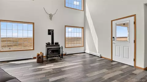 Living - 44166 E Iliff Trl, Bennett, CO 80102 photo 4 of 4