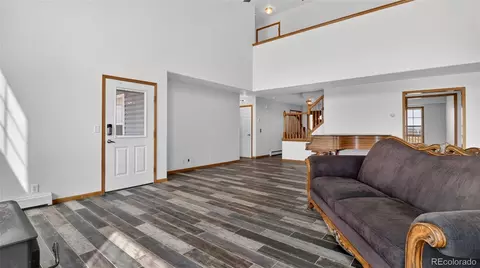 Living - 44166 E Iliff Trl, Bennett, CO 80102 photo 2 of 4