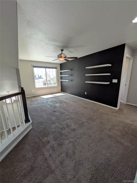 Living - 19613 E 39th Ave, Denver, CO 80249 photo 5 of 6