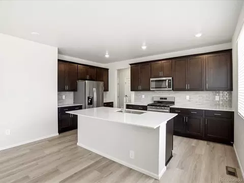Kitchen - 1606 Nathan River Dr, Windsor, CO 80550 photo 2 of 6