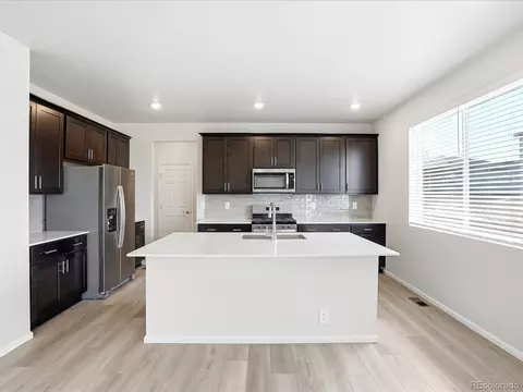 Kitchen - 1606 Nathan River Dr, Windsor, CO 80550 photo 4 of 6