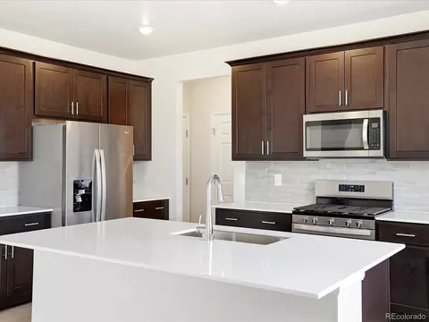Kitchen - 1606 Nathan River Dr, Windsor, CO 80550 photo 3 of 6