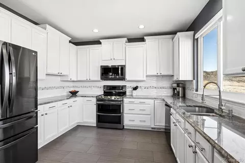 Kitchen - 4143 S Deframe Ct, Morrison, CO 80465 photo 4 of 4