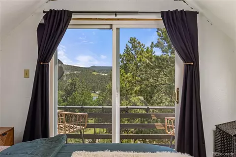 Bedroom - 9759 Fallen Rock Rd, Conifer, CO 80433 photo 5 of 9