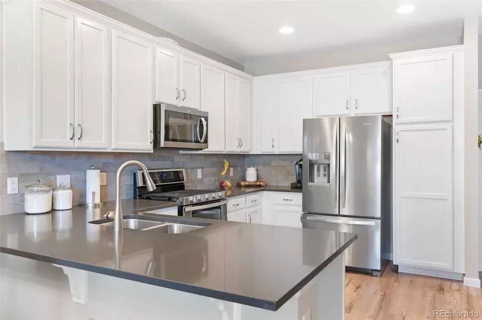 Kitchen - 15388 W 64th Dr #D, Arvada, CO 80007 photo 4 of 7