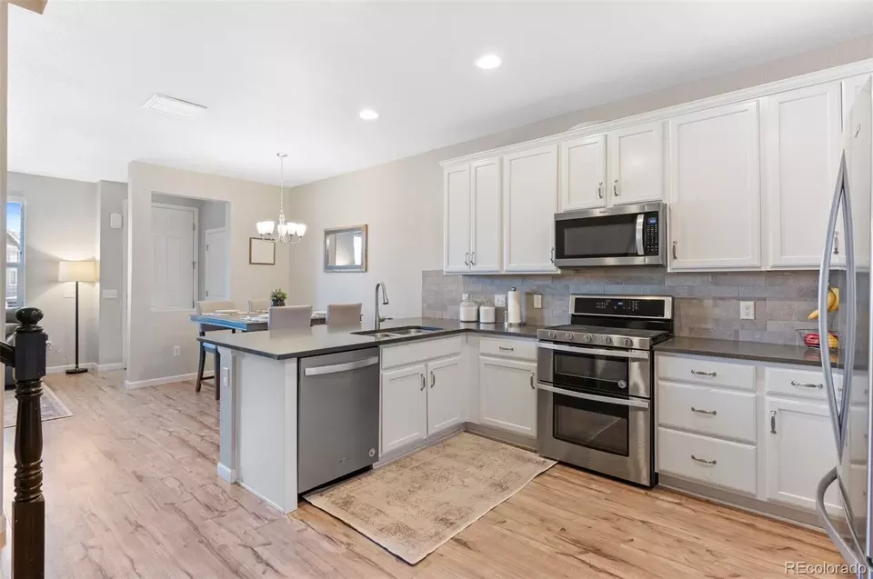 Kitchen - 15388 W 64th Dr #D, Arvada, CO 80007 photo 6 of 7