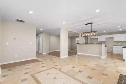 Living - 12978 Elgin Dr, Denver, CO 80239 photo 2 of 7