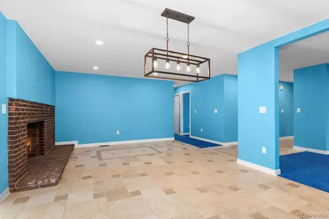 Living - 12978 Elgin Dr, Denver, CO 80239 photo 3 of 7