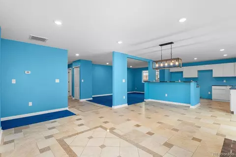 Living - 12978 Elgin Dr, Denver, CO 80239 photo 1 of 7