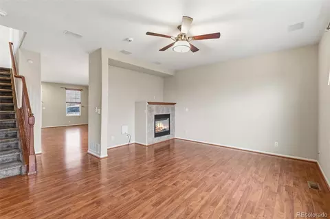 Living - 16020 E 55th Ave E, Denver, CO 80239 photo 4 of 9