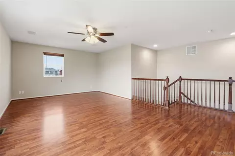 Living - 16020 E 55th Ave E, Denver, CO 80239 photo 7 of 9