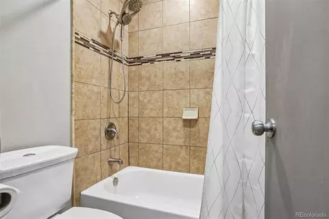 Bath - 4974 Jasper Ct, Denver, CO 80239 photo 2 of 2
