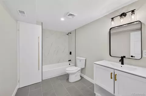 Bath - 150 E 49th Ave, Denver, CO 80216 photo 2 of 2