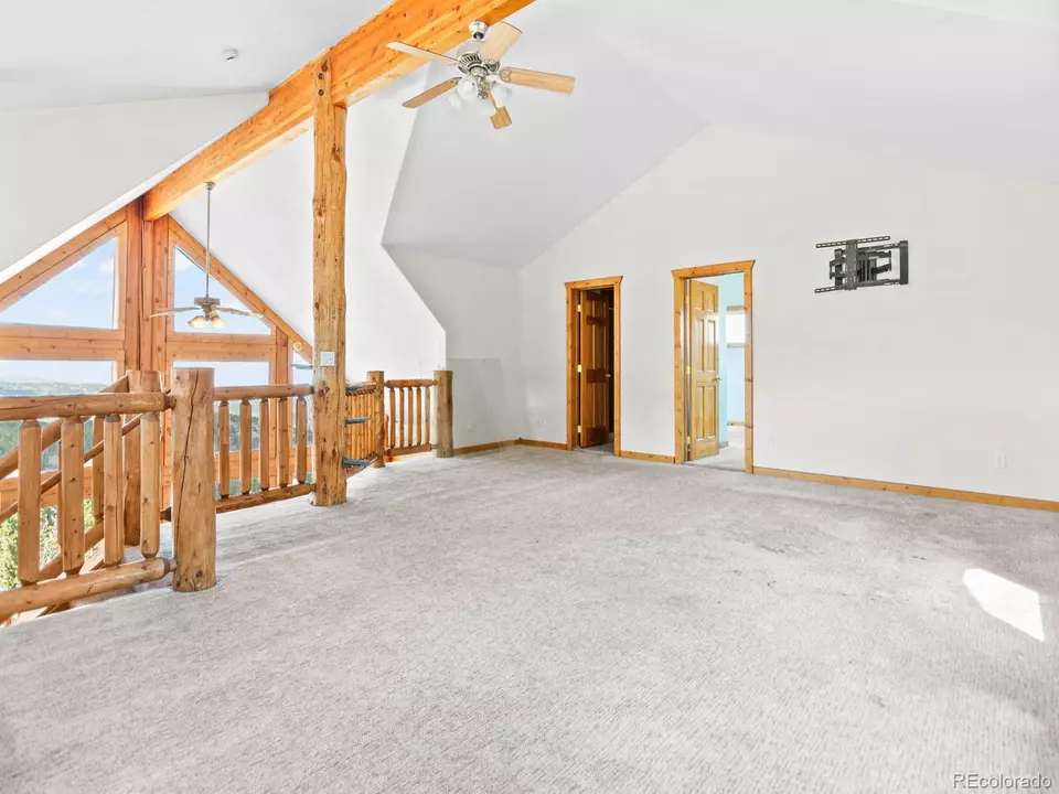 Living - 11766 Coal Creek Heights Dr, Golden, CO 80403 photo 4 of 8