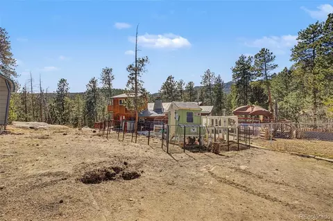 Exterior - 10116 Sprucedale Dr, Conifer, CO 80433 photo 3 of 10