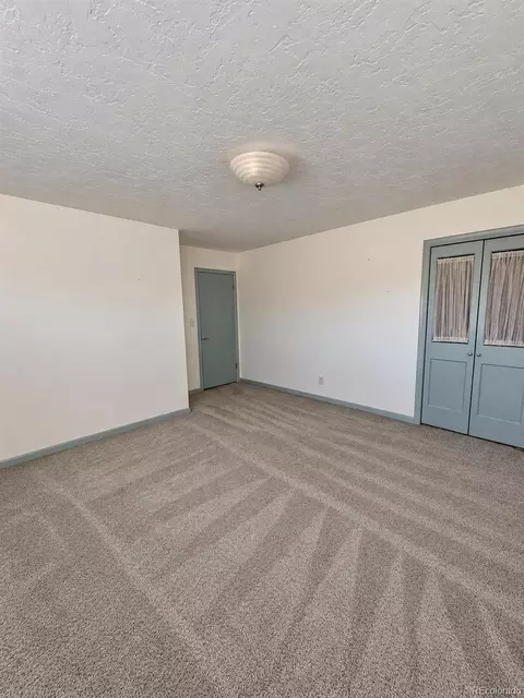 Bedroom - 402 S Stanolind Ave, Rangely, CO 81648 photo 3 of 13