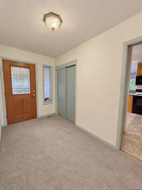 Entry Way - 402 S Stanolind Ave, Rangely, CO 81648 photo 1 of 2