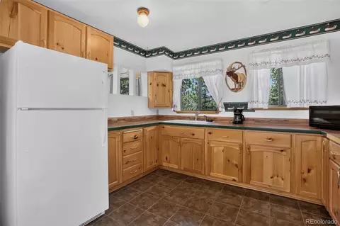 Kitchen - 211 Calle De Lujan, Shawnee, CO 80475 photo 2 of 2
