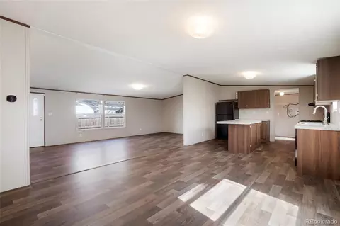 Living - 1104 Macdavidson Cir, Dacono, CO 80514 photo 1 of 3