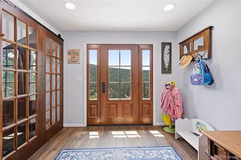 Entry Way - 23976 Bent Feather Rd, Conifer, CO 80433 photo 1 of 1