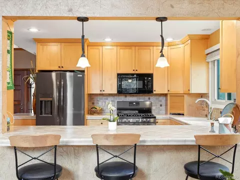 Kitchen - 16082 Deer Ridge Dr #C, Morrison, CO 80465 photo 7 of 7