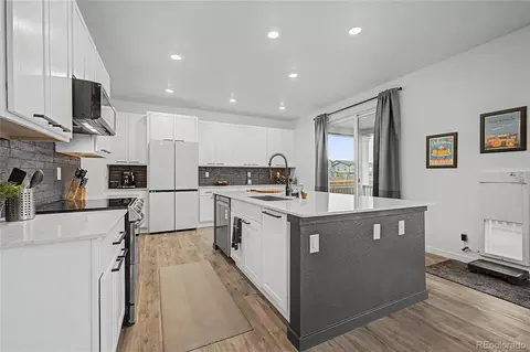 Kitchen - 28372 E 7th Ave, Watkins, CO 80137 photo 3 of 6