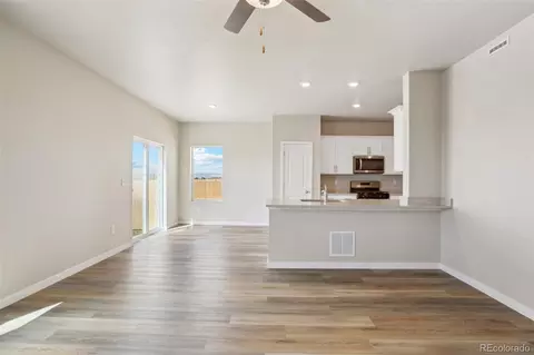 Living - 48215 Shetland Dr, Bennett, CO 80102 photo 3 of 4