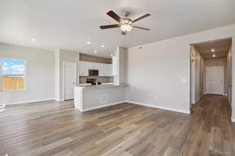 Living - 48215 Shetland Dr, Bennett, CO 80102 photo 2 of 4