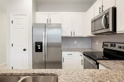 Kitchen - 16249 Elk Dr, Denver, CO 80239 photo 3 of 3