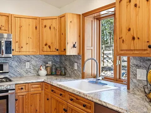 Kitchen - 9808 Fallen Rock Rd, Conifer, CO 80433 photo 4 of 7