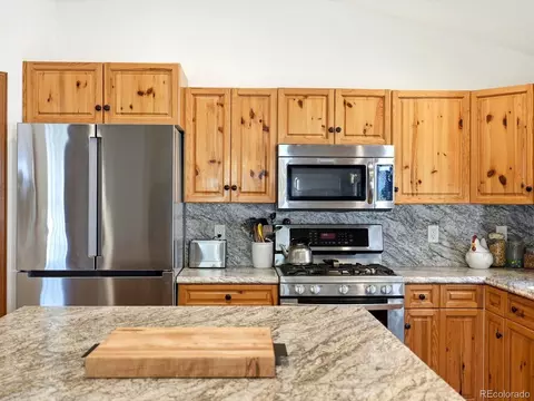 Kitchen - 9808 Fallen Rock Rd, Conifer, CO 80433 photo 5 of 7