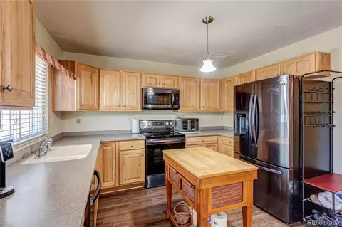 Kitchen - 5101 Perth St, Denver, CO 80249 photo 3 of 4