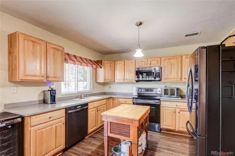 Kitchen - 5101 Perth St, Denver, CO 80249 photo 2 of 4