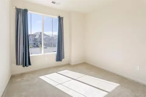 Bedroom - 5755 S Buchanan Ct #E, Aurora, CO 80016 photo 3 of 4