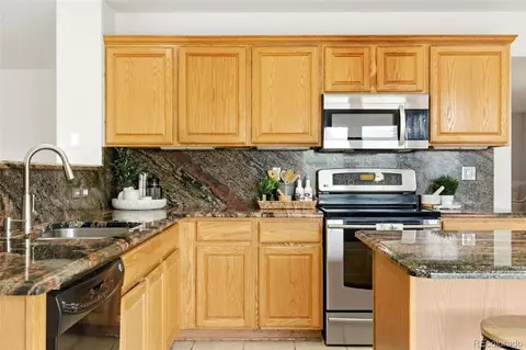 Kitchen - 3033 E 108th Dr, Northglenn, CO 80233 photo 4 of 5