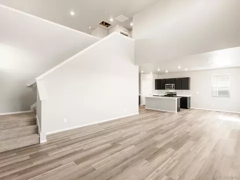 Living - 12067 E 101st Ave, Commerce City, CO 80022 photo 2 of 3