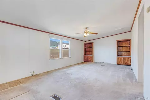 Living - 104 Highland Dr, Howard, CO 81233 photo 5 of 9
