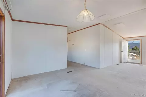 Living - 104 Highland Dr, Howard, CO 81233 photo 8 of 9