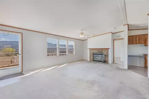 Living - 104 Highland Dr, Howard, CO 81233 photo 4 of 9